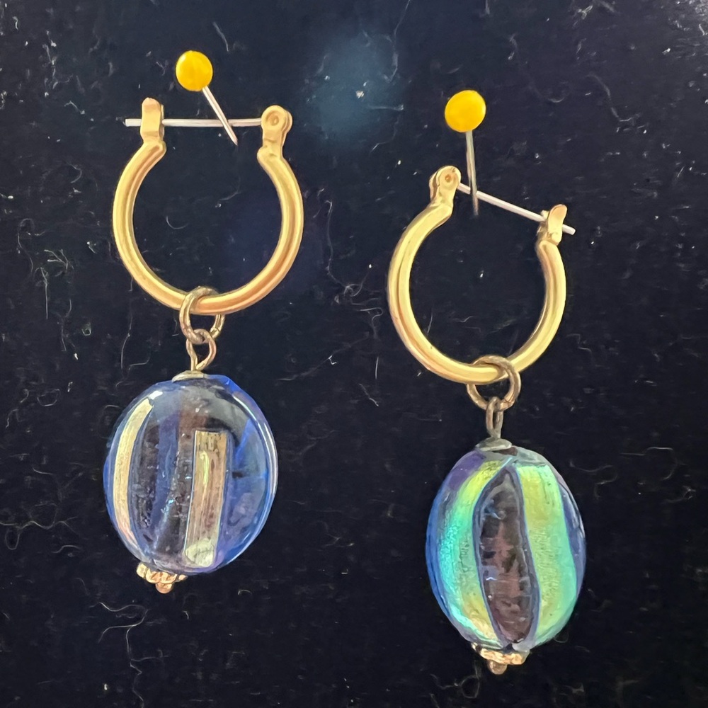 Vintage gold tone hoops with 925 closures and art glass with iridescent strips.